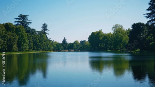 The peaceful tranquility of the Bois de Vincennes, with its expansive lake and serene paths lined with trees.