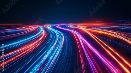 Abstract colorful light trails on a dark background.