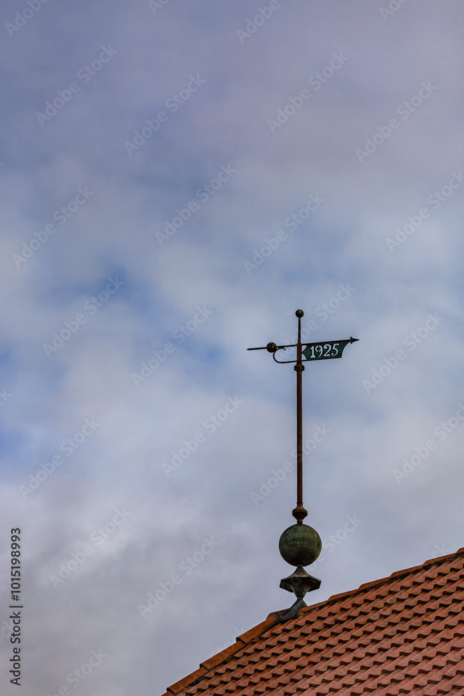 Metallic cross on the roof, Reykjavik, the capital city of Iceland Metallic cross on the roof, Reykjavik, the capital city of Iceland