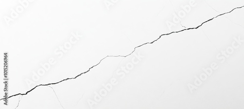 Crack on White Wall. A Long, Thin Crack Runs Diagonally Across a Pristine White Surface