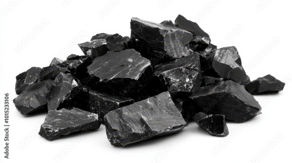 Pile of black coal pieces with rough jagged edges isolated on a clean white background Pile of black coal pieces with rough jagged edges isolated on a clean white background