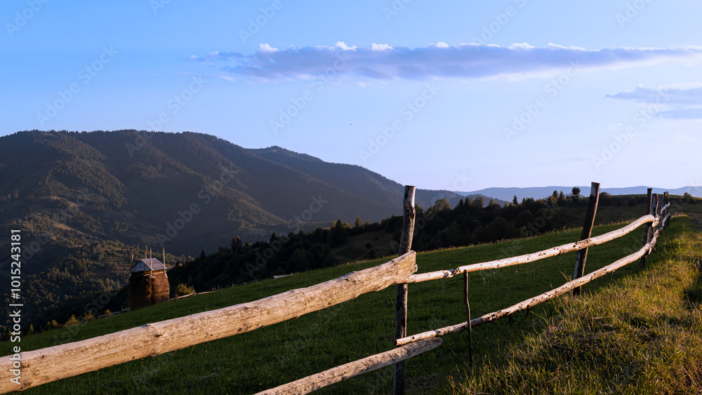 Mountain agricultural summer landscape at sunset. Mountain agricultural summer landscape at sunset.