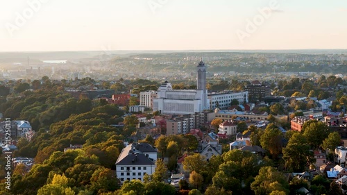 Christ's Resurrection Church in Zaliakalnis district in Kaunas, Lithuania. Aerial 4K drone video footage in autumn photo