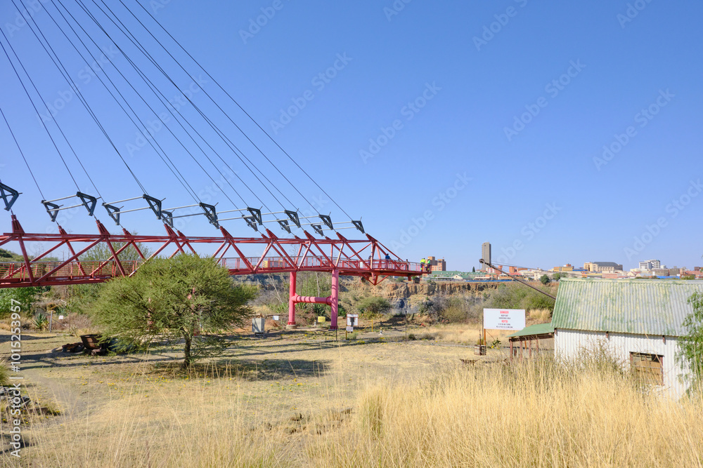 Bridge to the viewing platform over looking The Big Hole in Kimberley, South Africa