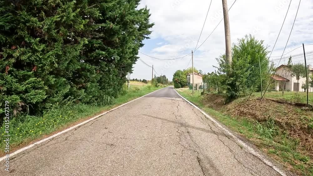 Via Francigena - a paved road near Costamezzana (Noceto), Province of Parma, Emilia-Romagna region, Italy Via Francigena - a paved road near Costamezzana (Noceto), Province of Parma, Emilia-Romagna region, Italy