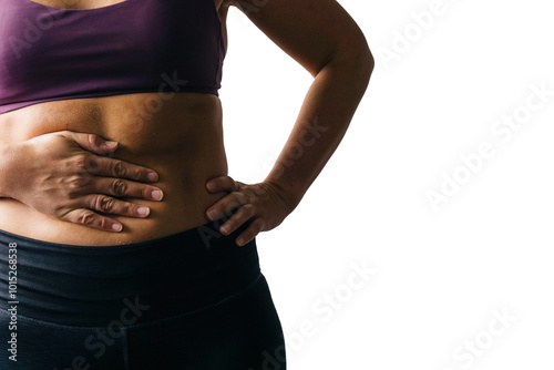 Isolated woman's abdomen with hand holding stomach