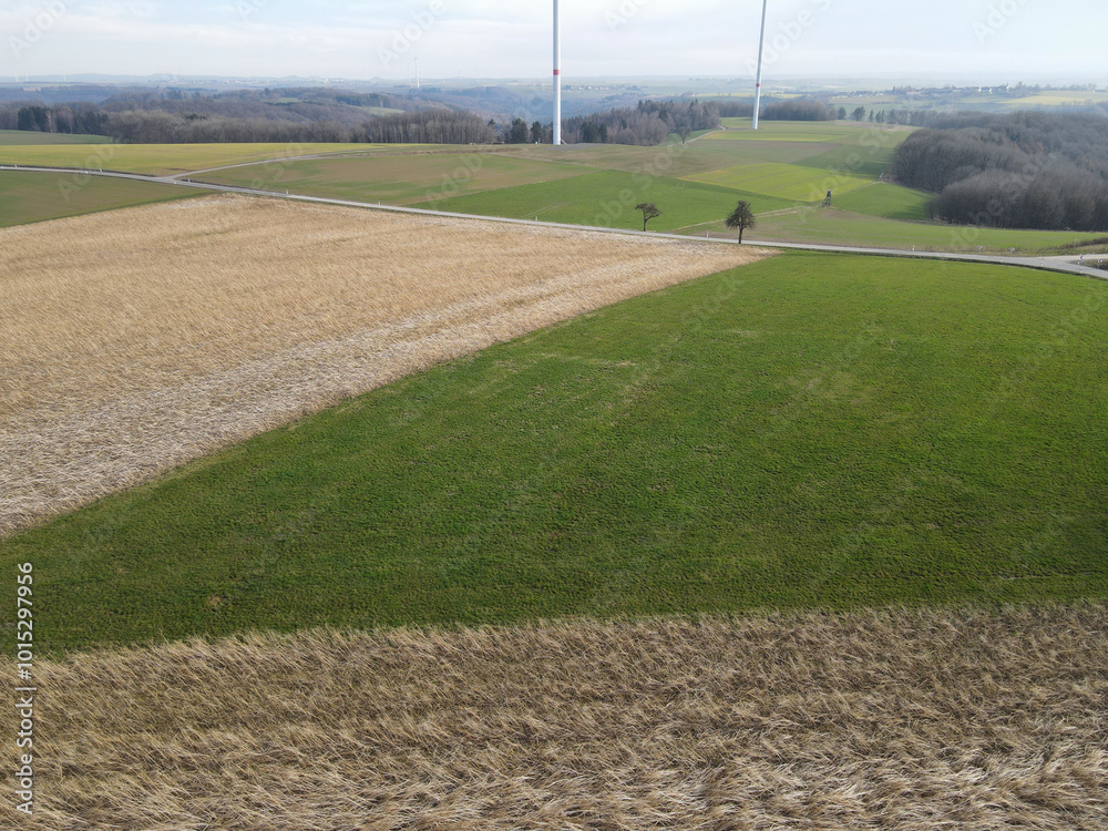Obraz premium View from above of farm fields in the countryside in spring