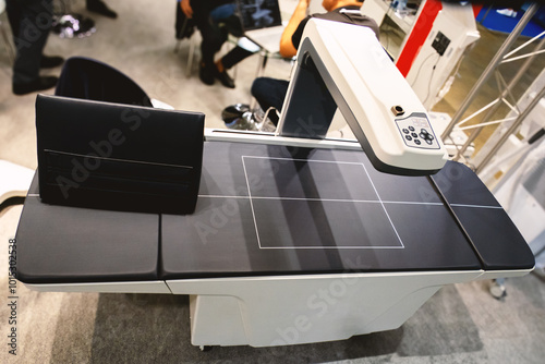 Central Dual X-ray Absorptiometry (DXA) device. Axial table DXA scanner specially designed with an innovative pencil beam DXA technology photo