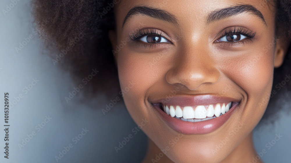 Portrait of young black African American woman with perfect healthy pearly white teeth smile. Health, teeth whitening, dental care, dentistry, stomatology concept Portrait of young black African American woman with perfect healthy pearly white teeth smile. Health, teeth whitening, dental care, dentistry, stomatology concept