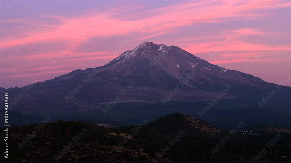 An incredibly epic aerial shot of Mount Shasta, California, masterfully bathed in the stunning hues of sunset, showcasing its majestic beauty and the overall serene atmosphere that envelops it An incredibly epic aerial shot of Mount Shasta, California, masterfully bathed in the stunning hues of sunset, showcasing its majestic beauty and the overall serene atmosphere that envelops it