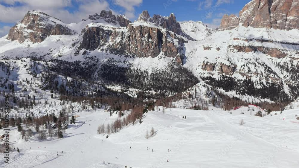 Aerial mountain landscape of skiers Skiing in Dolomites Alps on a Sunny Day Aerial mountain landscape of skiers Skiing in Dolomites Alps on a Sunny Day