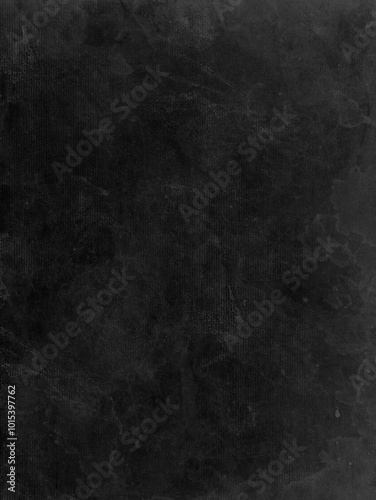 Black textured grunge background with aged, presenting grunge aesthetics with rough, irregular patterns and tones.