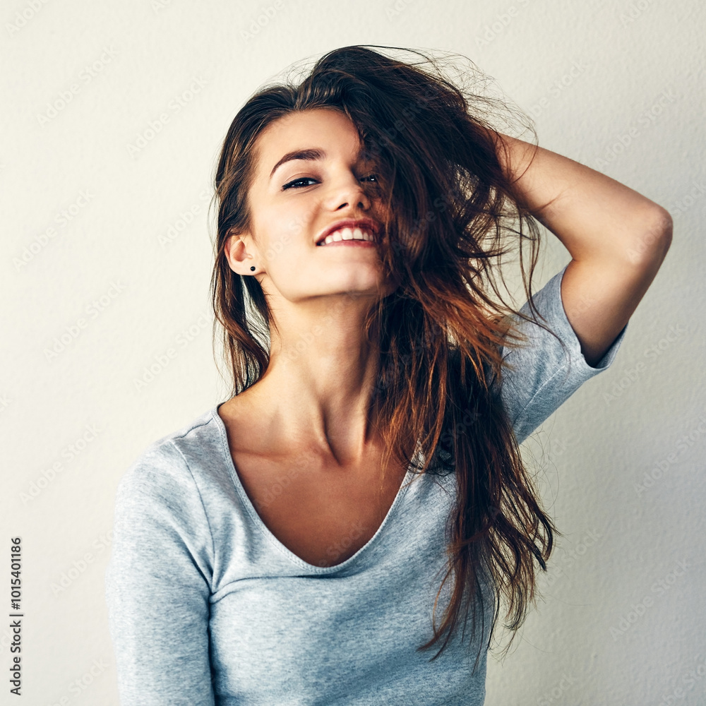 Fototapeta premium Beauty, hair care and portrait of happy woman with glow, texture and growth. Face, confident model and hairstyle at salon for makeup cosmetics, color and treatment results on white wall background