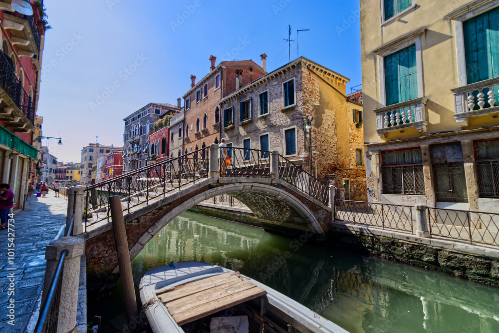 Low bridges crossing the canals and connecting the streets, Venice, Italy