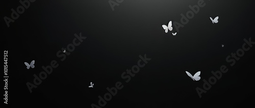 Weiße Schmetterlinge tanzen vor schwarzem Hintergrund