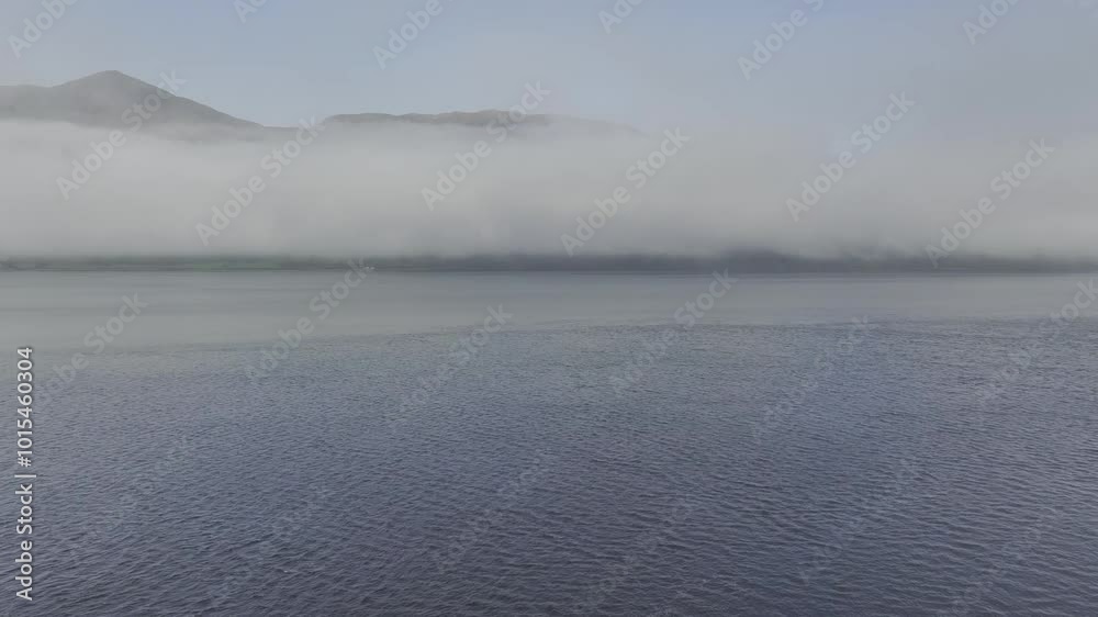 Morning fog over Loch Linnhe at the narrows near Ardgour, drone image, Western Highlands, Scotland, Great Britain Morning fog over Loch Linnhe at the narrows near Ardgour, drone image, Western Highlands, Scotland, Great Britain