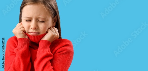 Ill little girl on light bl...