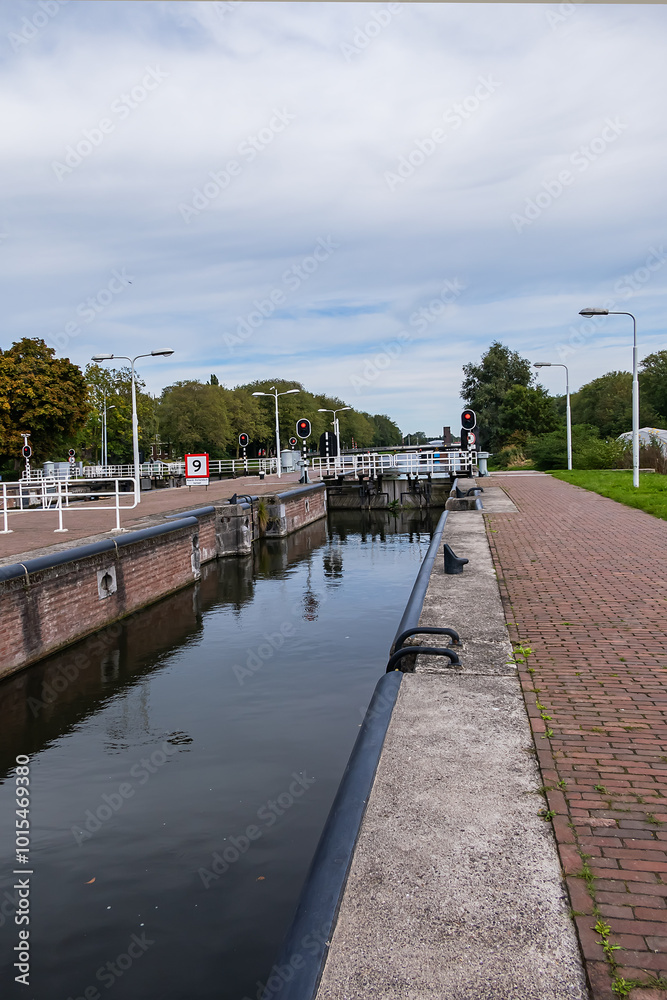 Amsterdam Willem I Lock. Willem I Lock is a monumental lock in Amsterdam-Noord. First built in 13 December 1824. Amsterdam, the Netherlands. Amsterdam Willem I Lock. Willem I Lock is a monumental lock in Amsterdam-Noord. First built in 13 December 1824. Amsterdam, the Netherlands.