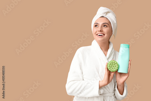 Happy young woman with hair...