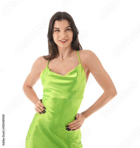 Beautiful young woman in stylish green dress on white background