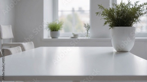 white table with white mug and magazine on top of it in a minimalist room with plants near the window