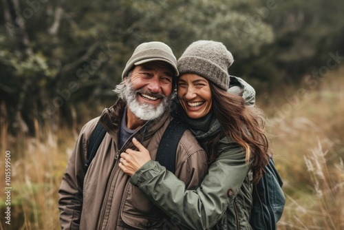 Portrait of a happy couple in love on a hike in nature.