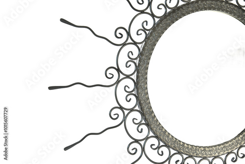 Obraz na płótnie An intricate metal sunburst featuring swirling, ornamental wire rays and a circular, hollow center. The handcrafted design exudes a vintage, artisanal charm, perfect for decorative use. w salonie