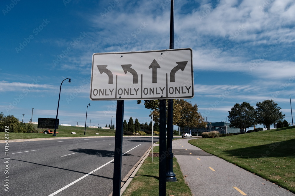 Multi Lane Sign Street signs indicating traffic flow for a multi-lane road. Stock Photo ...