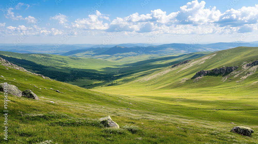 A high mountain plateau covered with green grass, overlooking distant ranges and deep valleys. A high mountain plateau covered with green grass, overlooking distant ranges and deep valleys.