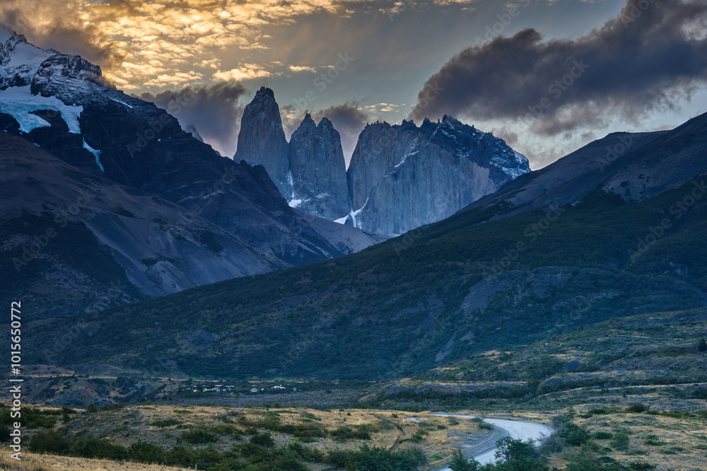 Fototapeta premium Torres del Paine in Patagonia, Chile. These iconic granite towers rise dramatically above the surrounding wilderness, creating one of the most famous landscapes in South America