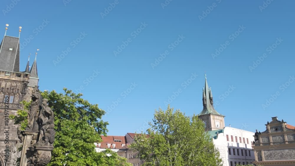 View of Prague’s Old Town Bridge Tower and Bedrich Smetana Museum on a clear sunny day