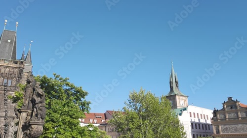 View of Prague’s Old Town Bridge Tower and Bedrich Smetana Museum on a clear sunny day photo