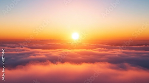 A tranquil sunrise over a sea of fog, with warm hues of orange and pink reflecting off the mist.