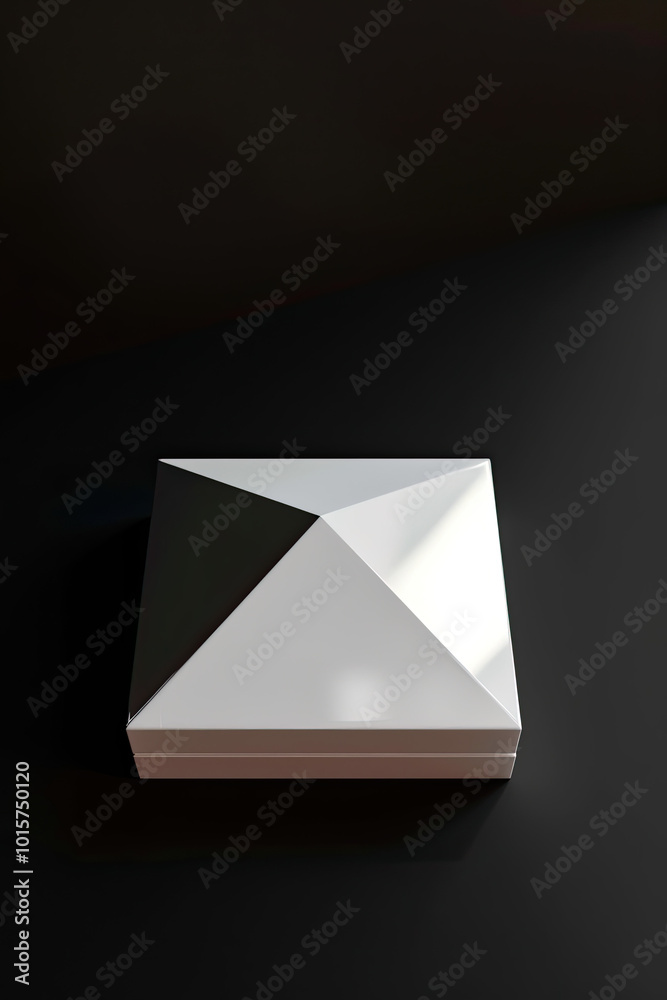 Small glossy white triangular box, flat on black background, soft light creates subtle highlights. Small glossy white triangular box, flat on black background, soft light creates subtle highlights.