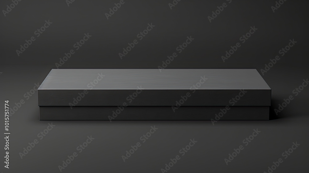 Wide, flat matte slate gray box, on its side against black, soft top highlights enhance dimensions. Wide, flat matte slate gray box, on its side against black, soft top highlights enhance dimensions.
