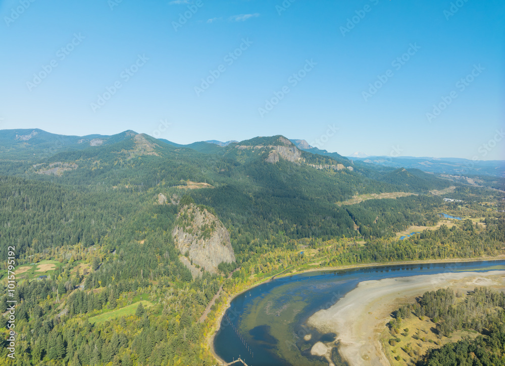 A beautiful mountain range with a river running through it A beautiful mountain range with a river running through it