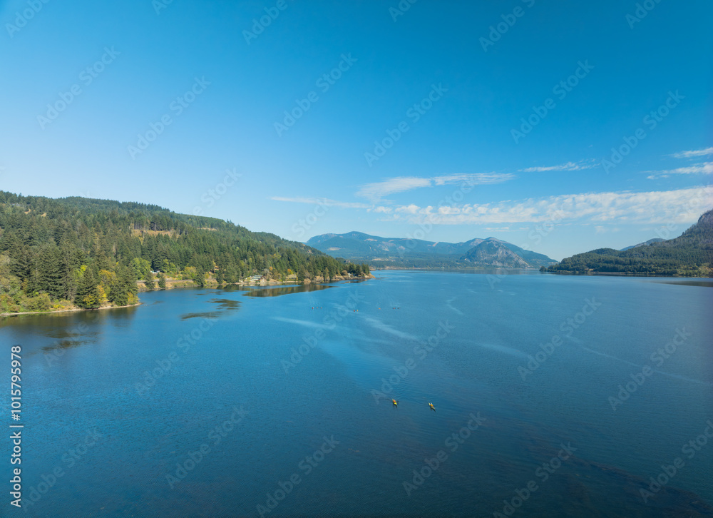 A beautiful lake with mountains in the background A beautiful lake with mountains in the background