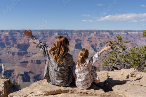 Mother with daughter at Grand Canyon National park, Arizona, USA. 
