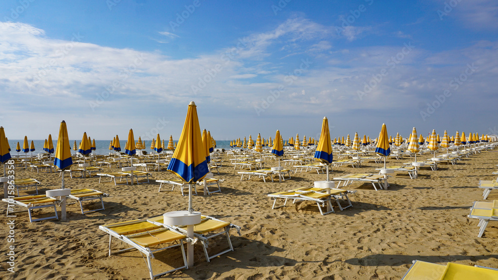 Umbrellas on the beach of Lido di Jesolo near Venice, Veneto region, Italy.