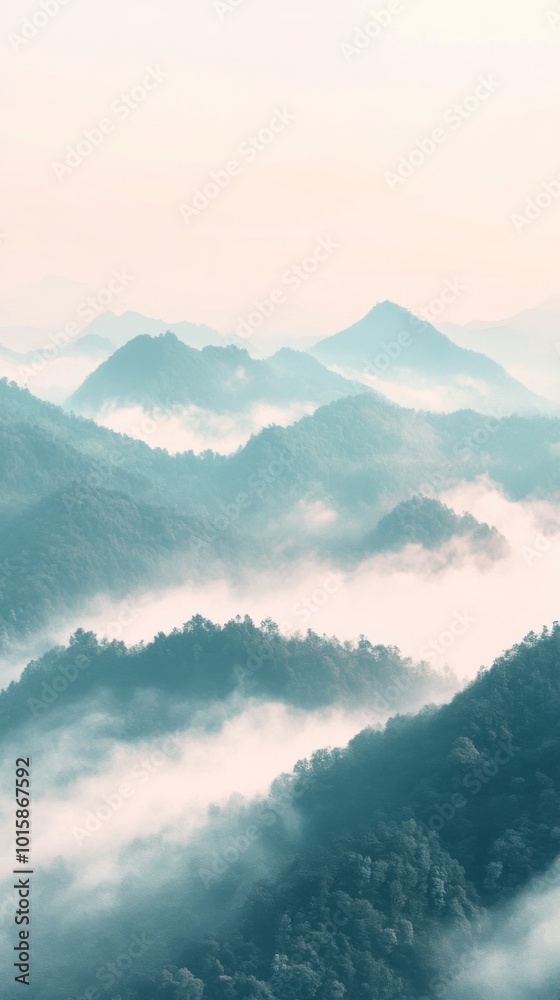 Serene mountain landscape with clouds enveloping the peaks, creating a tranquil atmosphere filled with soft pastel colors and gentle fog, perfect for nature lovers and calming decor.

