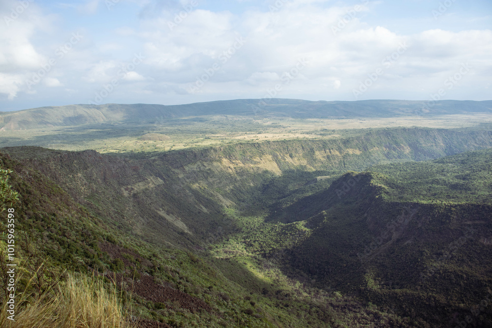 A view of a volcanic crater from the peak of the mountain 