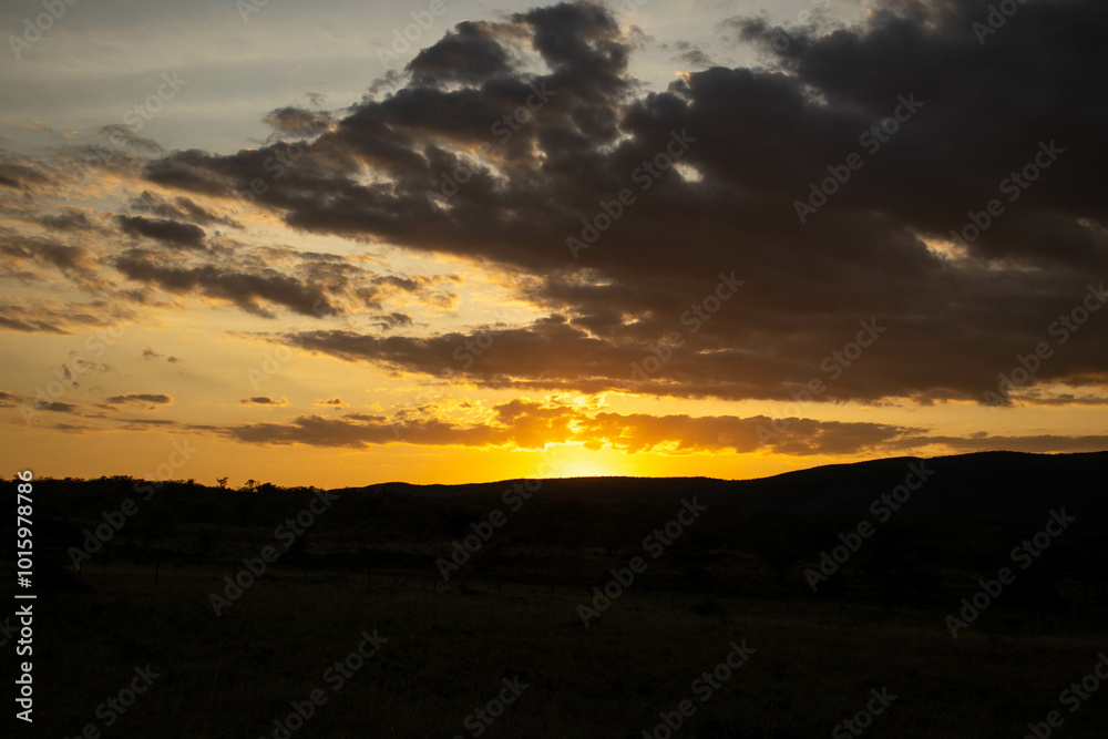 A moody sky at sunset in the hills