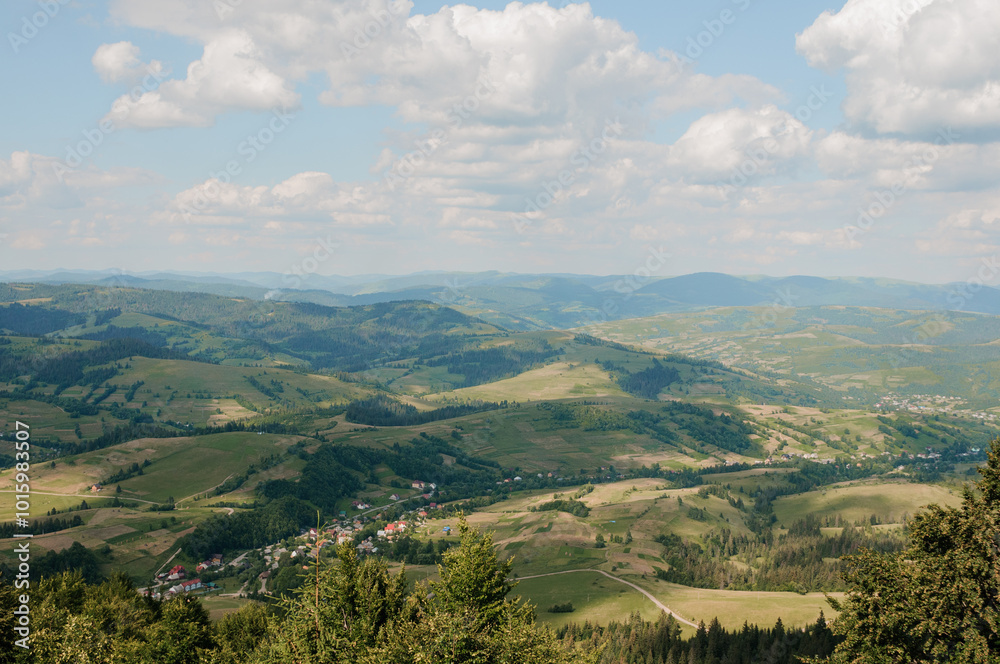 Serene Panoramic Landscape of Rolling Hills Under a Blue Sky Serene Panoramic Landscape of Rolling Hills Under a Blue Sky