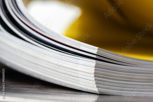 Stack of bent book pages, focus on their edges, close-up view