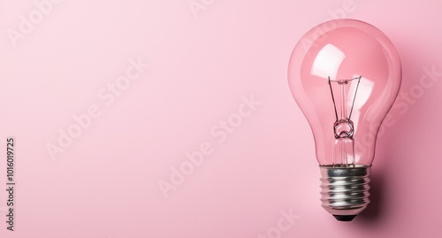 pink light bulb on pink background