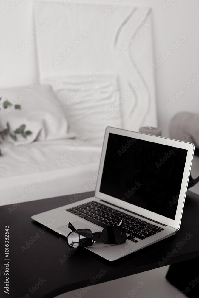 laptop in a modern interior in minimalist style - Image laptop in a modern interior in minimalist style - Image