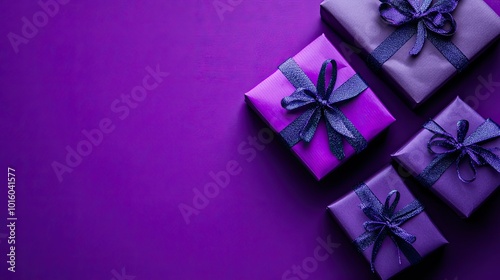 Elegant purple gift boxes arranged on a vibrant background