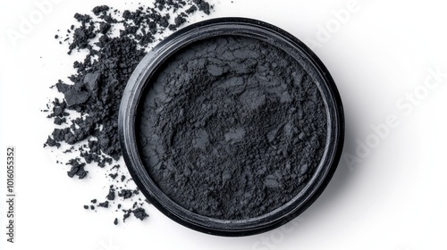 Black Cosmetic Clay Powder on a White Background from Top View