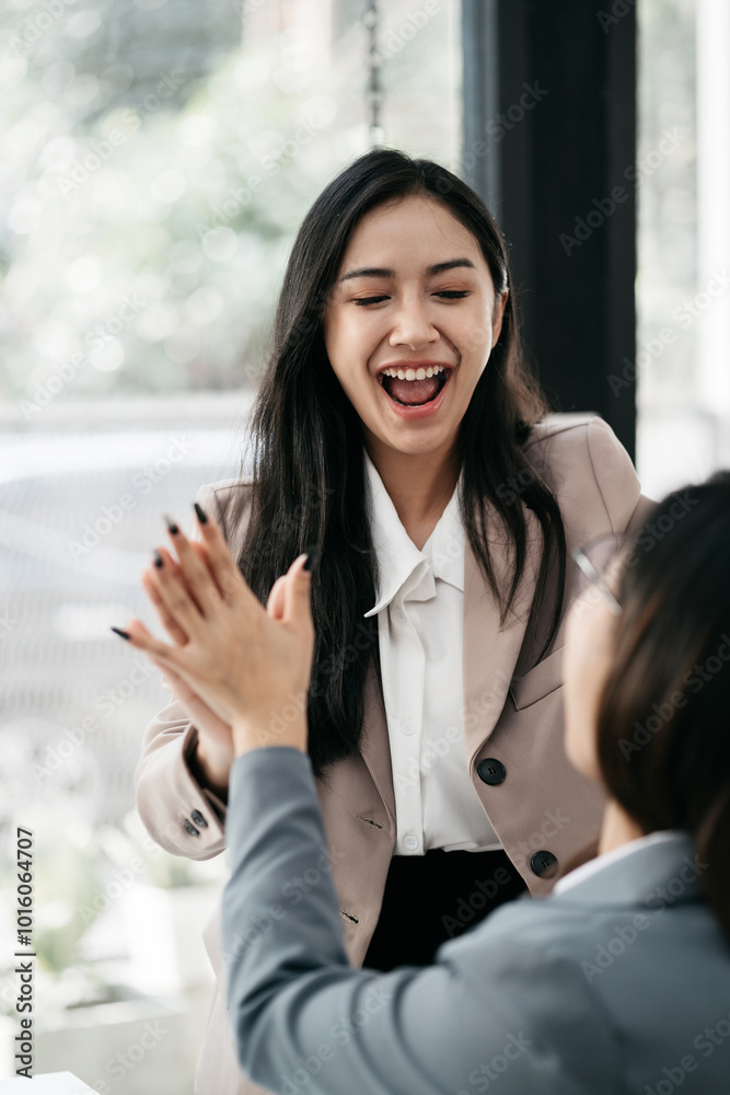Happy creative business people are motivated, giving high five and celebration successful deal. Cooperation Meeting Partnership Career growth Team building Successful business. Happy creative business people are motivated, giving high five and celebration successful deal. Cooperation Meeting Partnership Career growth Team building Successful business.