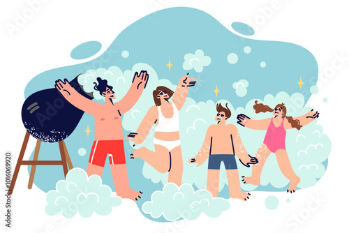 Foam party for family visiting aqua park, dancing near cannon to create foam and cheer up kids